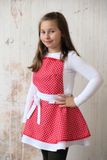 Dívčí kuchyňská zástěra červená tečkovaná (holčička 8 let)